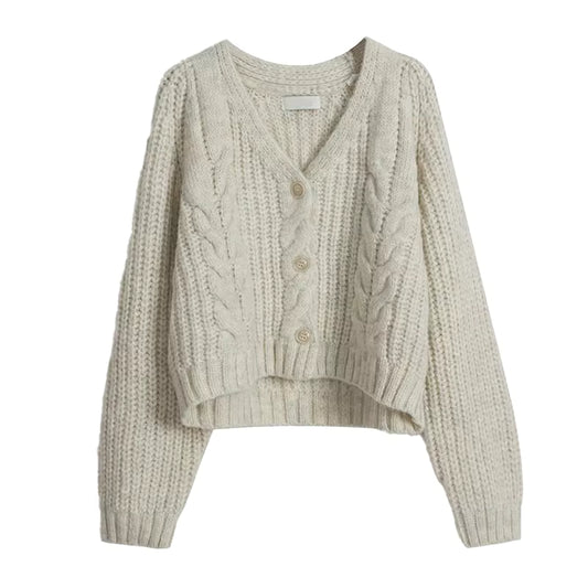 Knitted cardigan with cable pattern on a white background