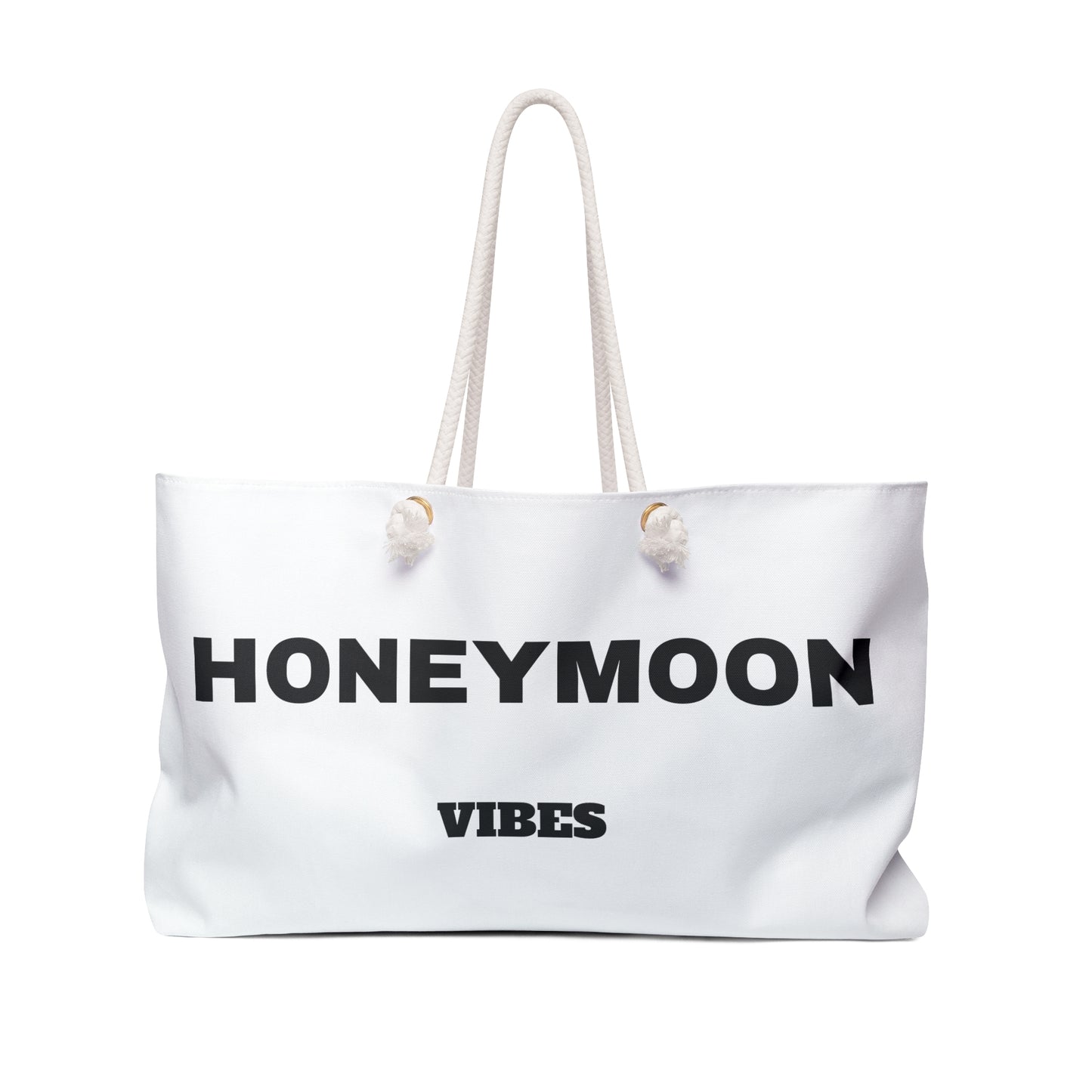 White tote bag with 'Honeymoon Vibes' text on a white background