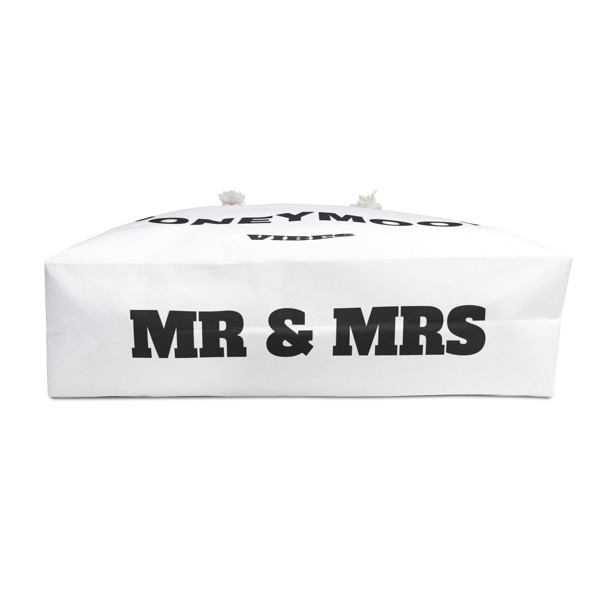 White box with 'MR & MRS' text on a white background