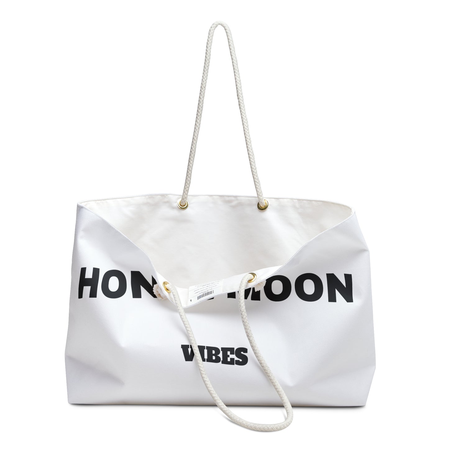 White tote bag with 'Honeymoon Vibes' text on a white background