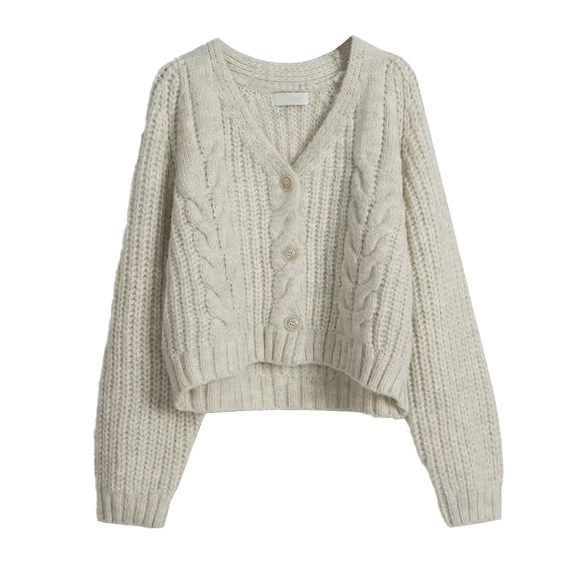 Knitted cardigan with cable pattern on a white background