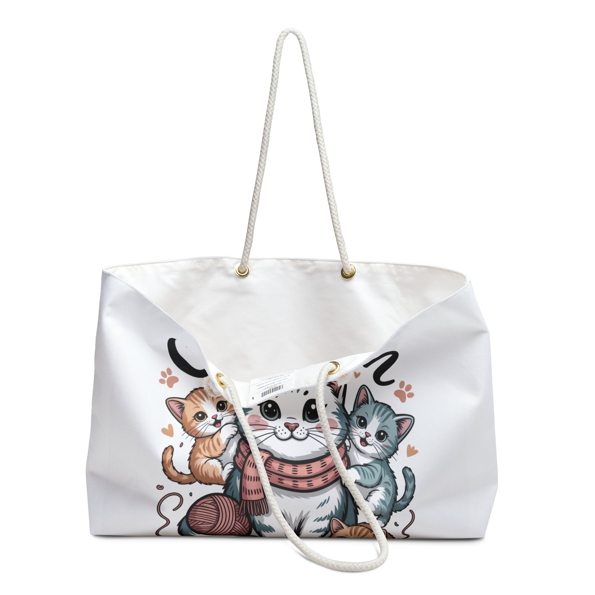 White tote bag with cat illustrations on a white background
